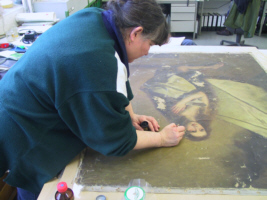 Sicherung der Farbschicht der Originalkopie "Heilige Agnes" nach Ribera, Exponat des Reiff-Museums
